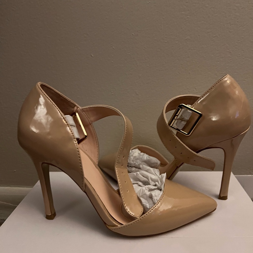 Nude Pumps size 6.5 with three inch heels
